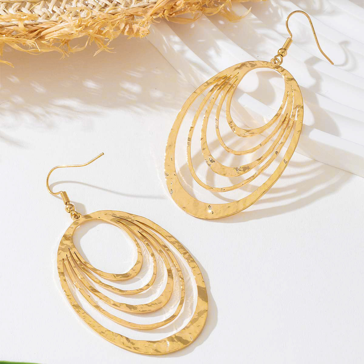 Elegant Gold Hollow Oval Drop Earrings