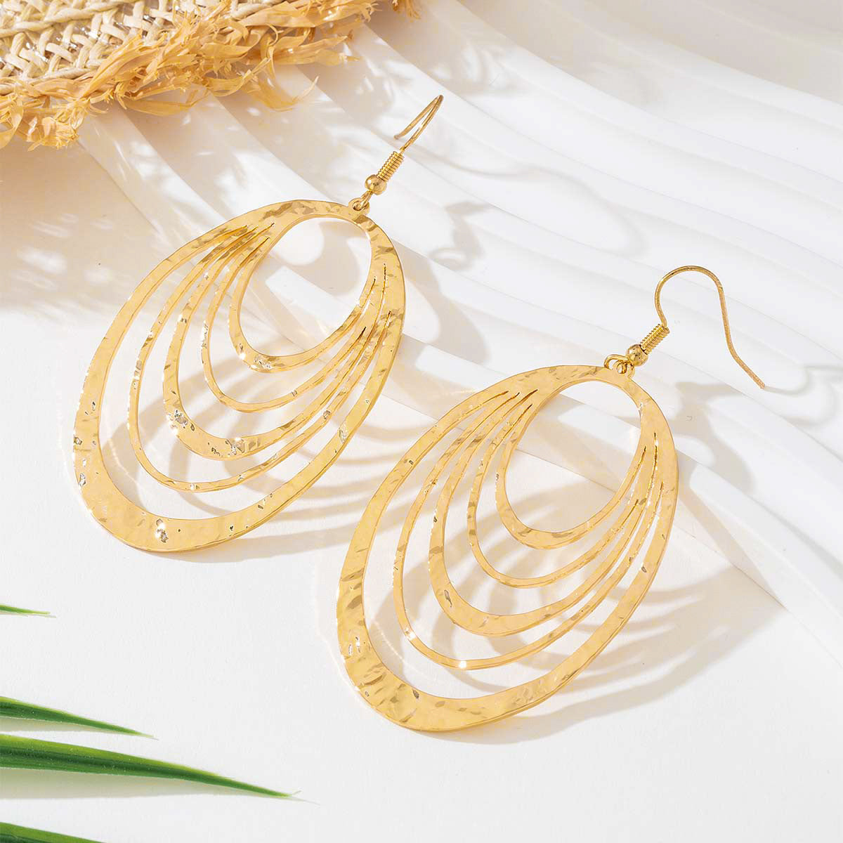 Elegant Gold Hollow Oval Drop Earrings