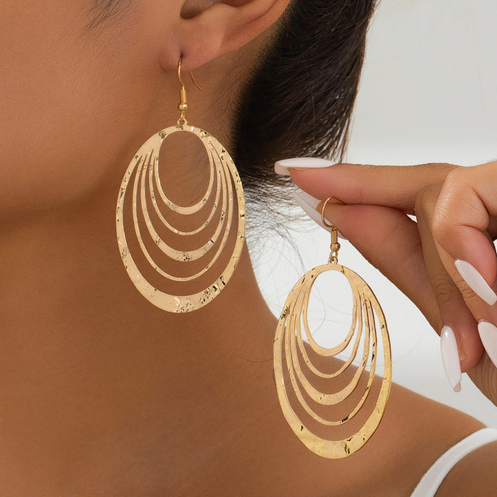 Elegant Gold Hollow Oval Drop Earrings