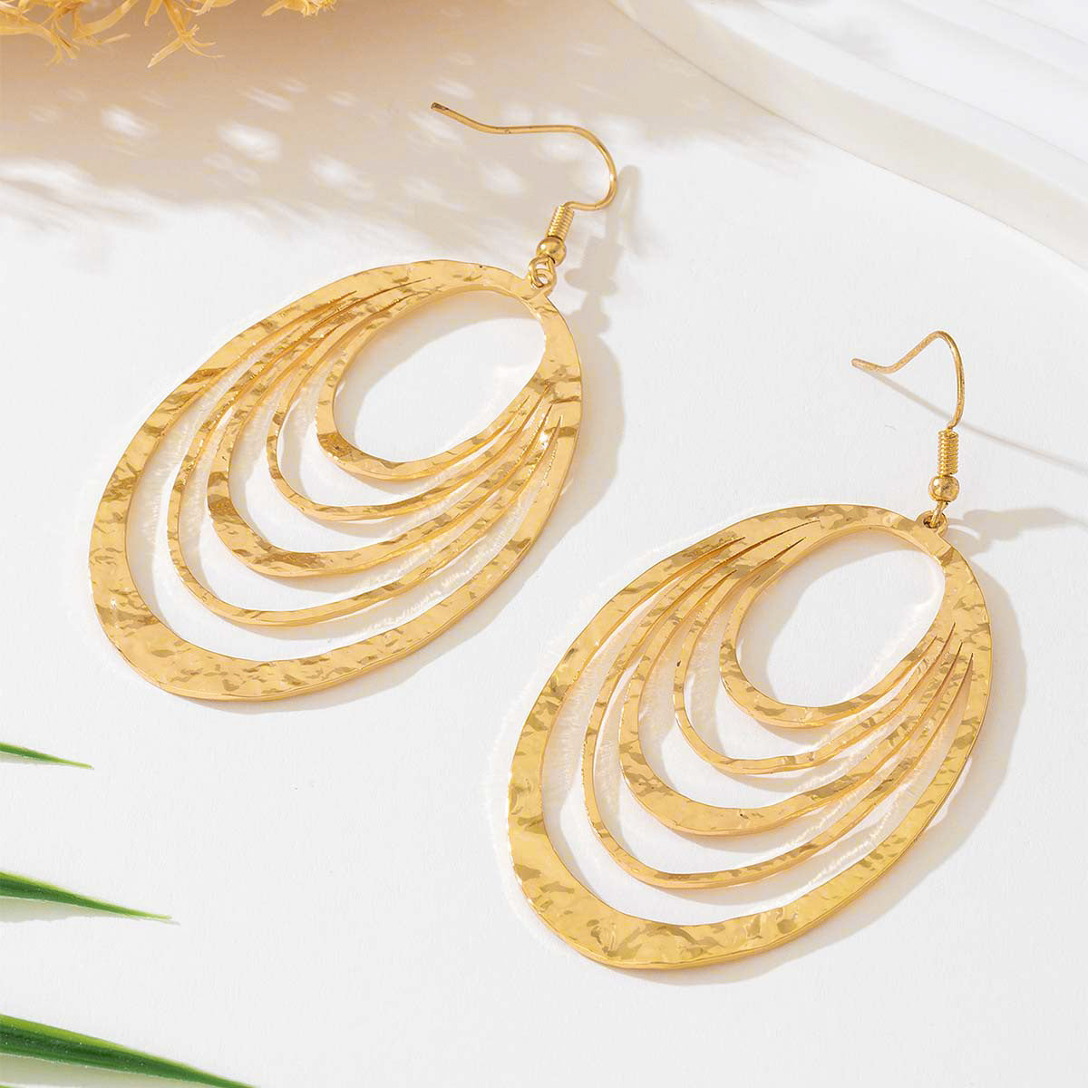 Elegant Gold Hollow Oval Drop Earrings