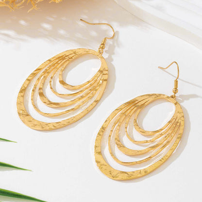 Elegant Gold Hollow Oval Drop Earrings