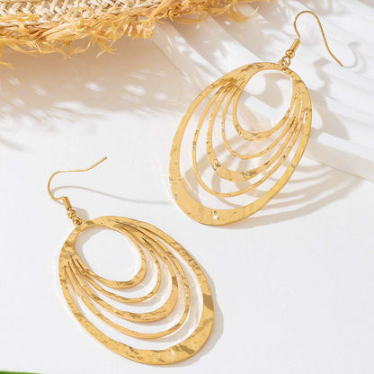 Elegant Gold Hollow Oval Drop Earrings