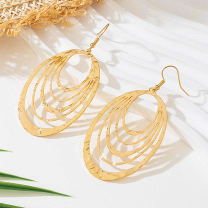 Elegant Gold Hollow Oval Drop Earrings